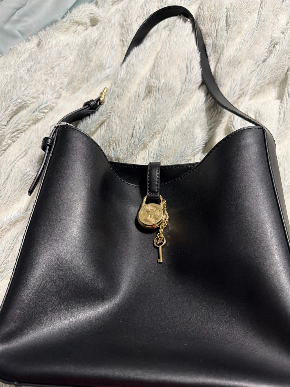 Michael Kors Black Leather Shoulder Bag with Gold Charm Pendant